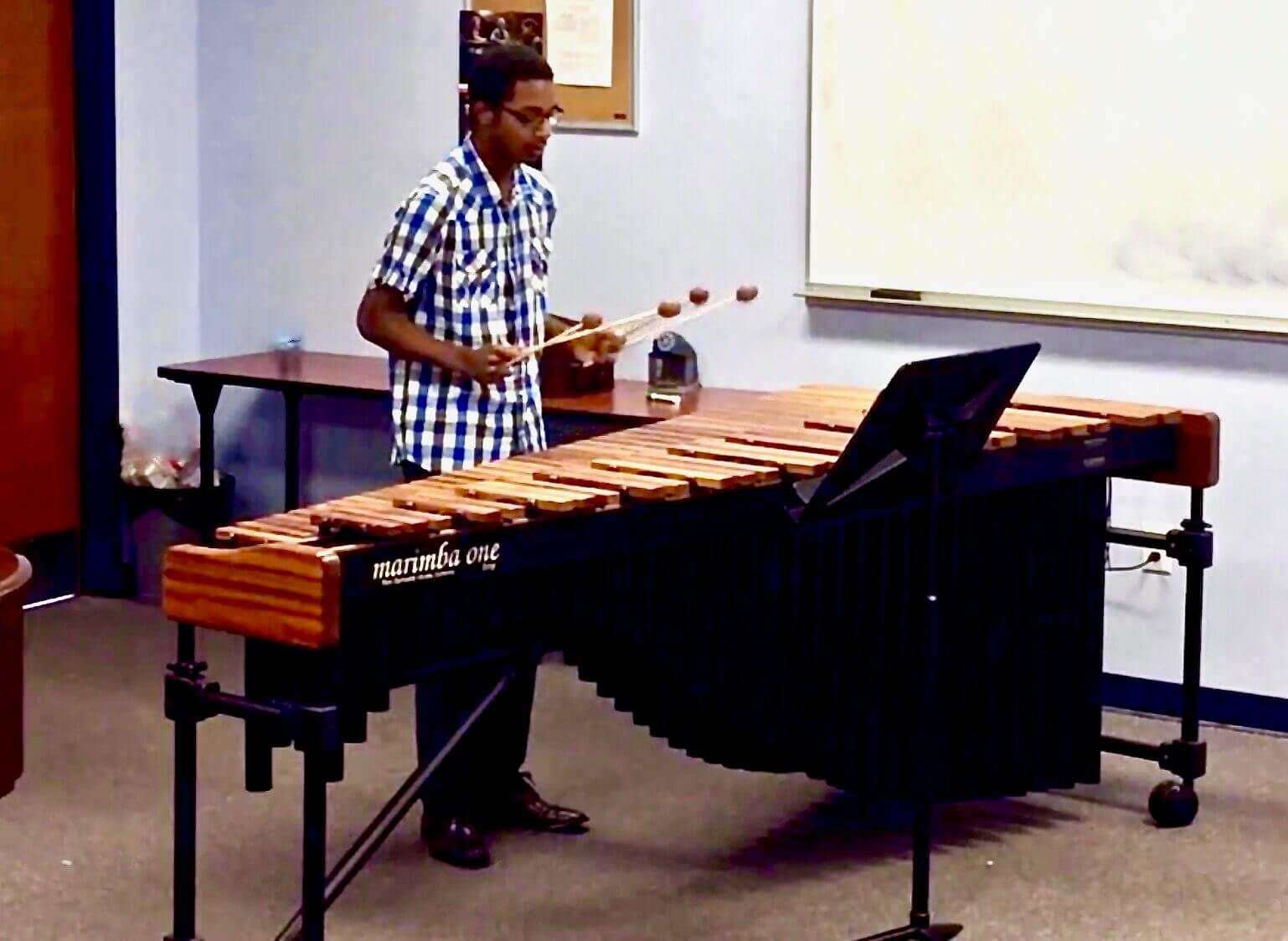 Isiah Playing Marimba